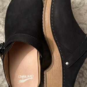 Dansko Black Leather Clogs with Tan Sole